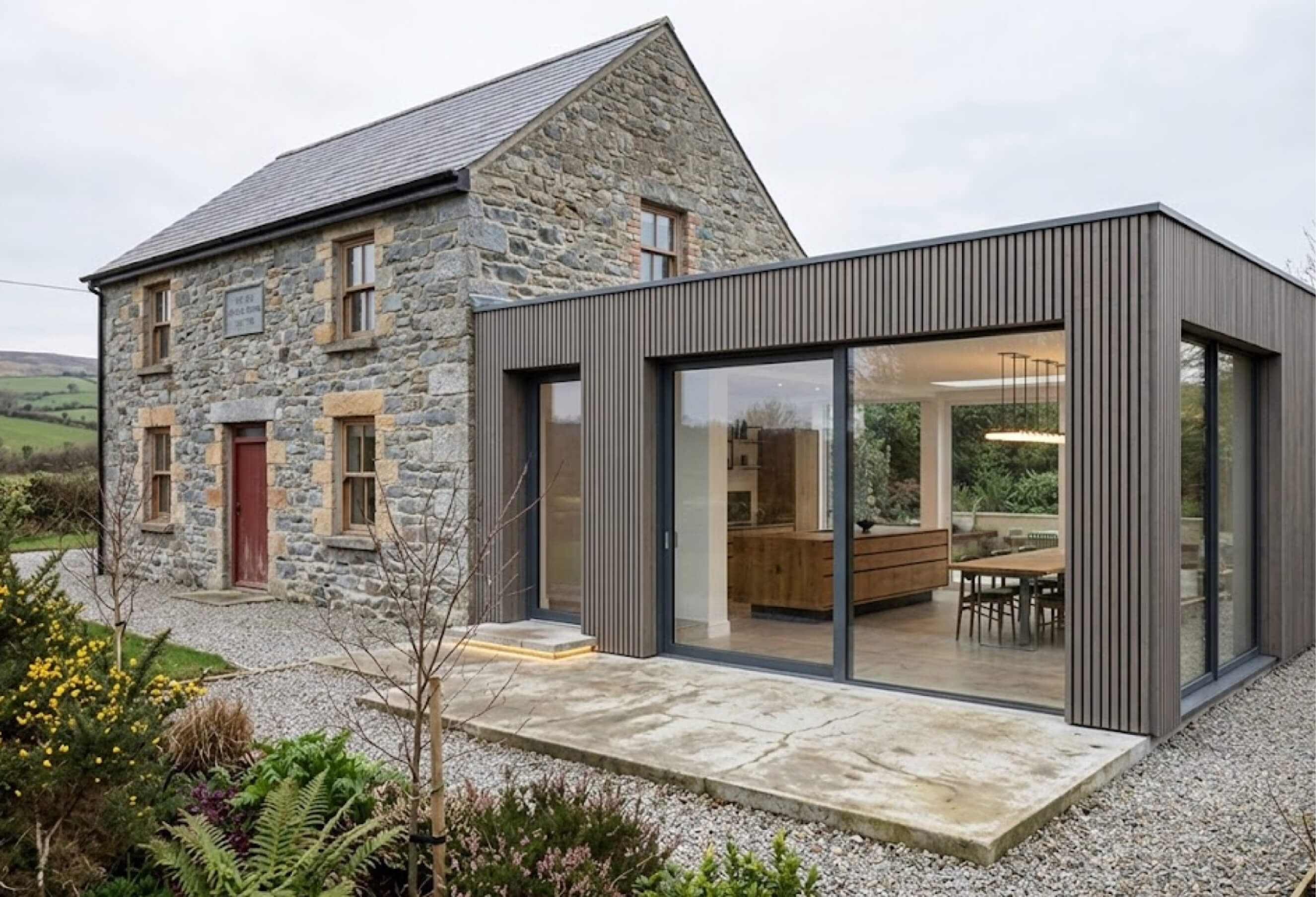 Stone cottage with modern cladded extension